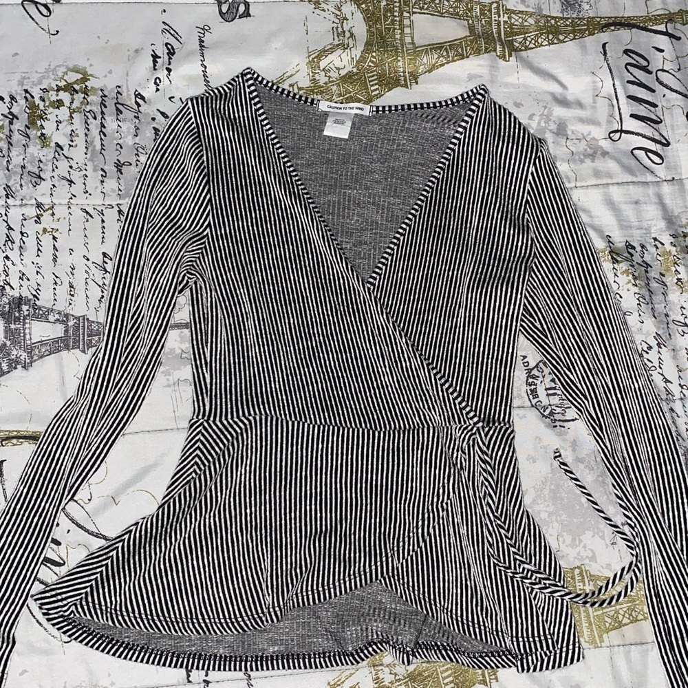 It’d a cute zebra pattern blouse 🤍